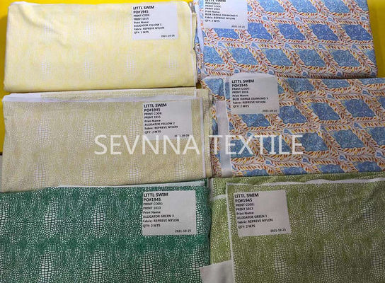 La tela reciclada resistente del traje de baño de la píldora para el laboratorio del color sumerge la huelga impresa Digitaces Offs