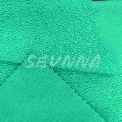 Tejido de punto atlético respirable de 270 gramos de peso Lavable por máquina para ropa activa