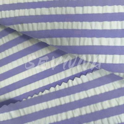 Tejido de nylon de spandex de 240 gramos 125 cm Pantalones de baño de playa y activistas
