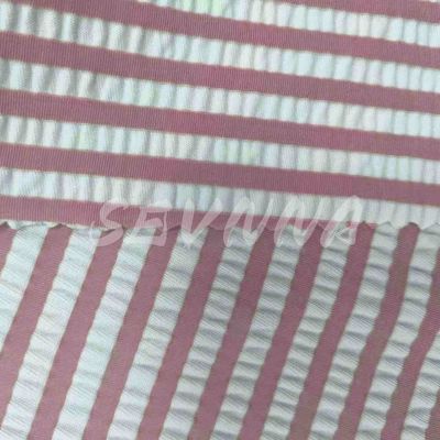 Tejido de poliéster espandéx de alto estiramiento para trajes de baño 55% poliéster reciclado 40% nylon 5%EL