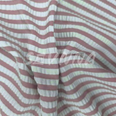 Tejido de poliéster espandéx de alto estiramiento para trajes de baño 55% poliéster reciclado 40% nylon 5%EL