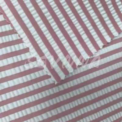 Tejido de poliéster espandéx de alto estiramiento para trajes de baño 55% poliéster reciclado 40% nylon 5%EL
