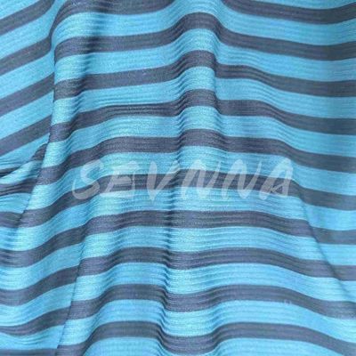 Tejido de poliéster reciclado lavable en máquina para una moda sostenible