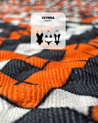 Tejido de baño texturizado de alta solidez del color con protección solar UPF 50+ y 95% nailon reciclado