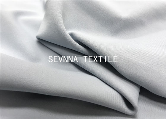 Pantalones de nylon reciclados tejido elástico llano del desgaste de la yoga de la durabilidad de la tela de la manera del color 4