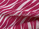 La cebra rosada que imprimía el llano extrafino de la tela del desgaste de la yoga de la fibra teñió