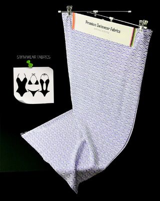 Tejido de traje de baño reciclado para hombres con 58% de poliéster reciclado 33% de nylon 9% de spandex para líneas de traje de baño sostenibles